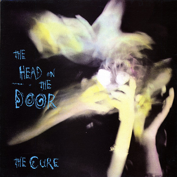 CURE, THE - THE HEAD ON THE DOOR